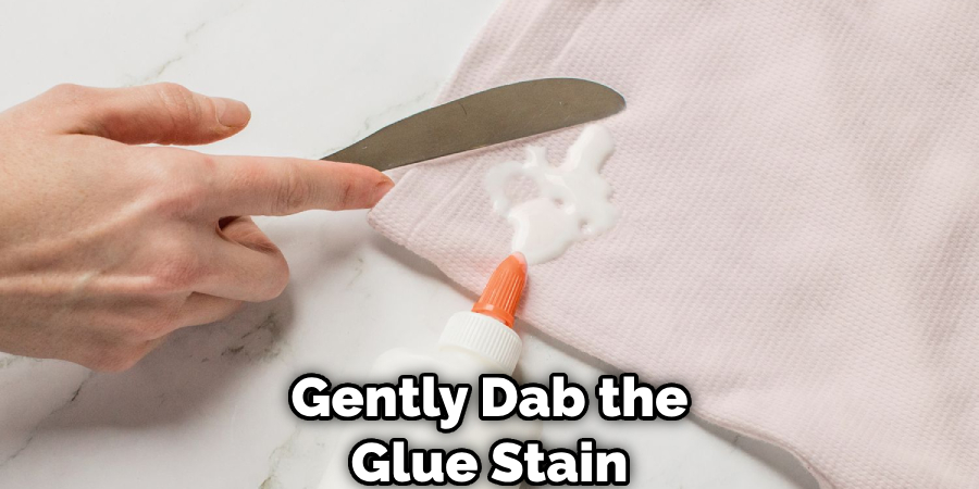 Gently Dab the Glue Stain