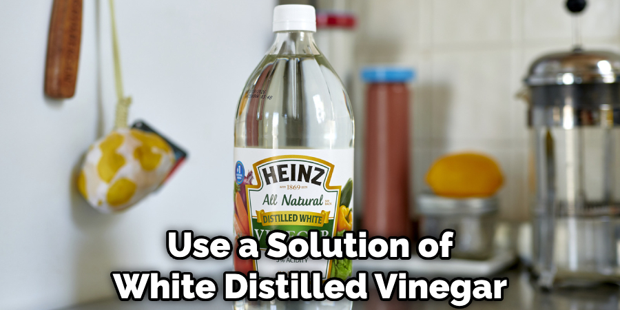 Use a Solution of White Distilled Vinegar