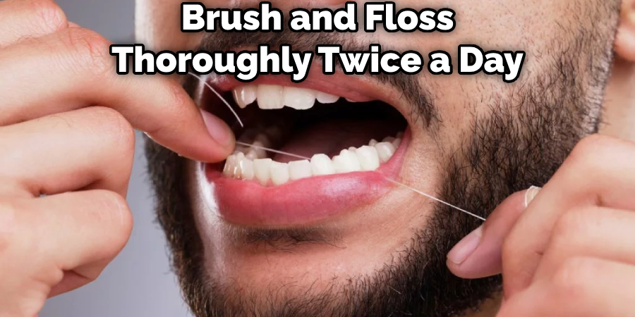 Brush and Floss Thoroughly Twice a Day