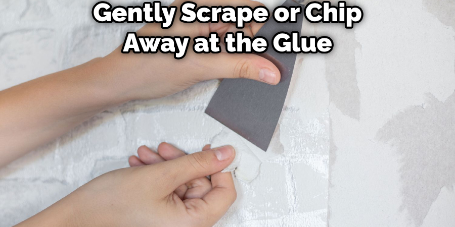 Gently Scrape or Chip Away at the Glue