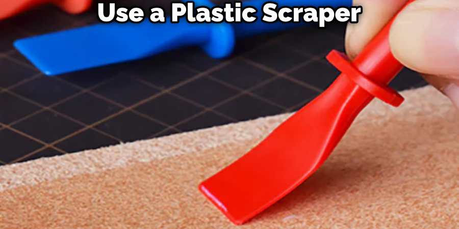 Use a Plastic Scraper