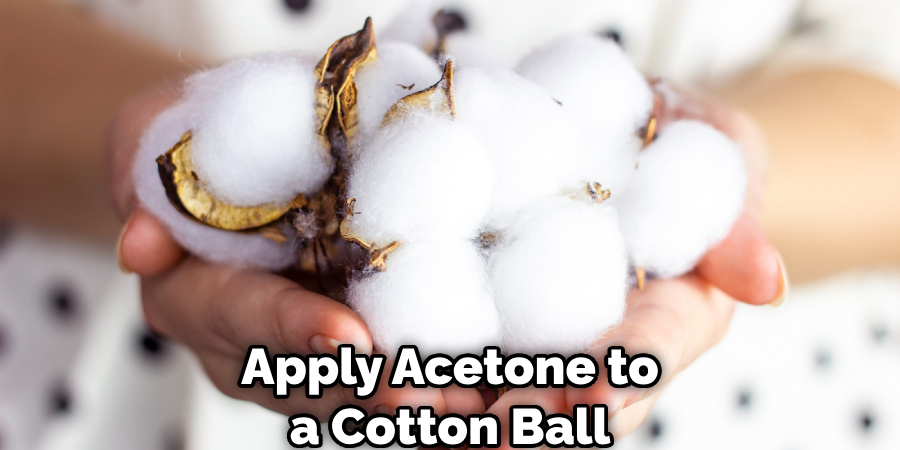 Apply Acetone to a Cotton Ball