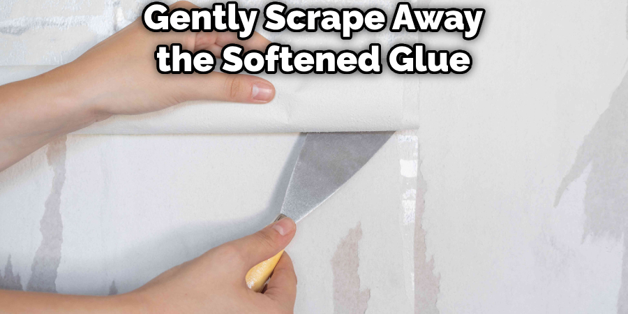 Gently Scrape Away the Softened Glue