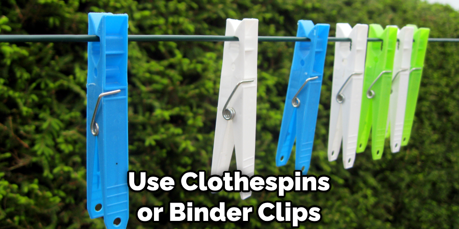 Use Clothespins or Binder Clips