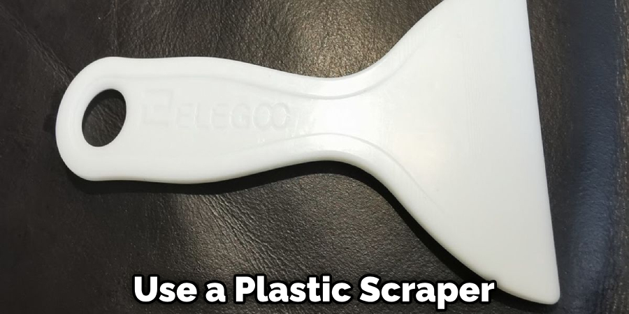 Use a Plastic Scraper